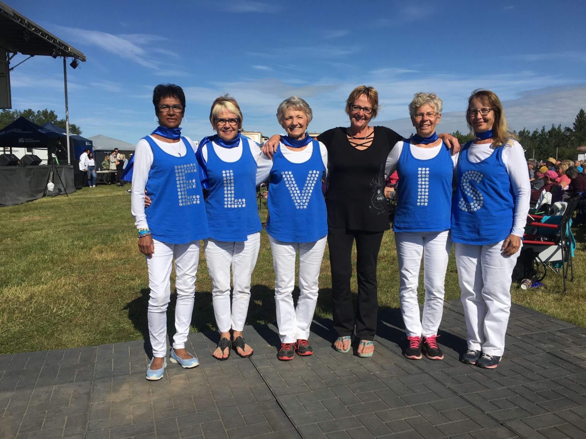 Blue Suede Music Festival official festival-ground photo with a stage at Westlock Ag Grounds